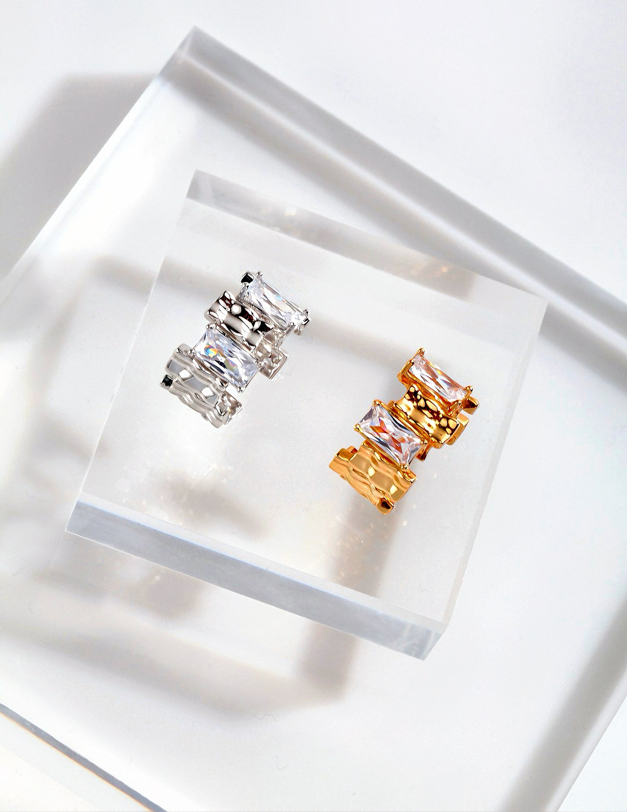 Ring with irregular rectangular spaced zircon design