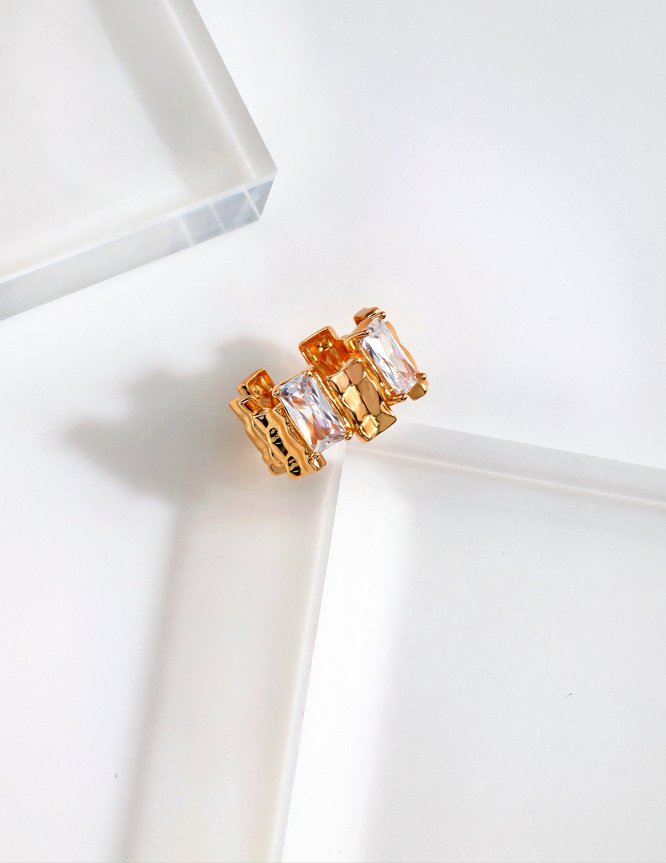 Ring with irregular rectangular spaced zircon design