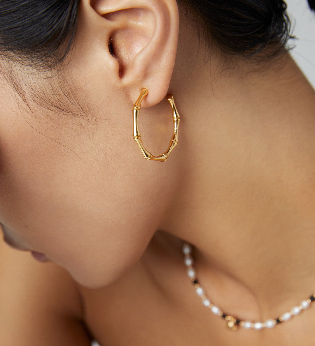 Sterling silver half-hoop earrings; bamboo joint earrings