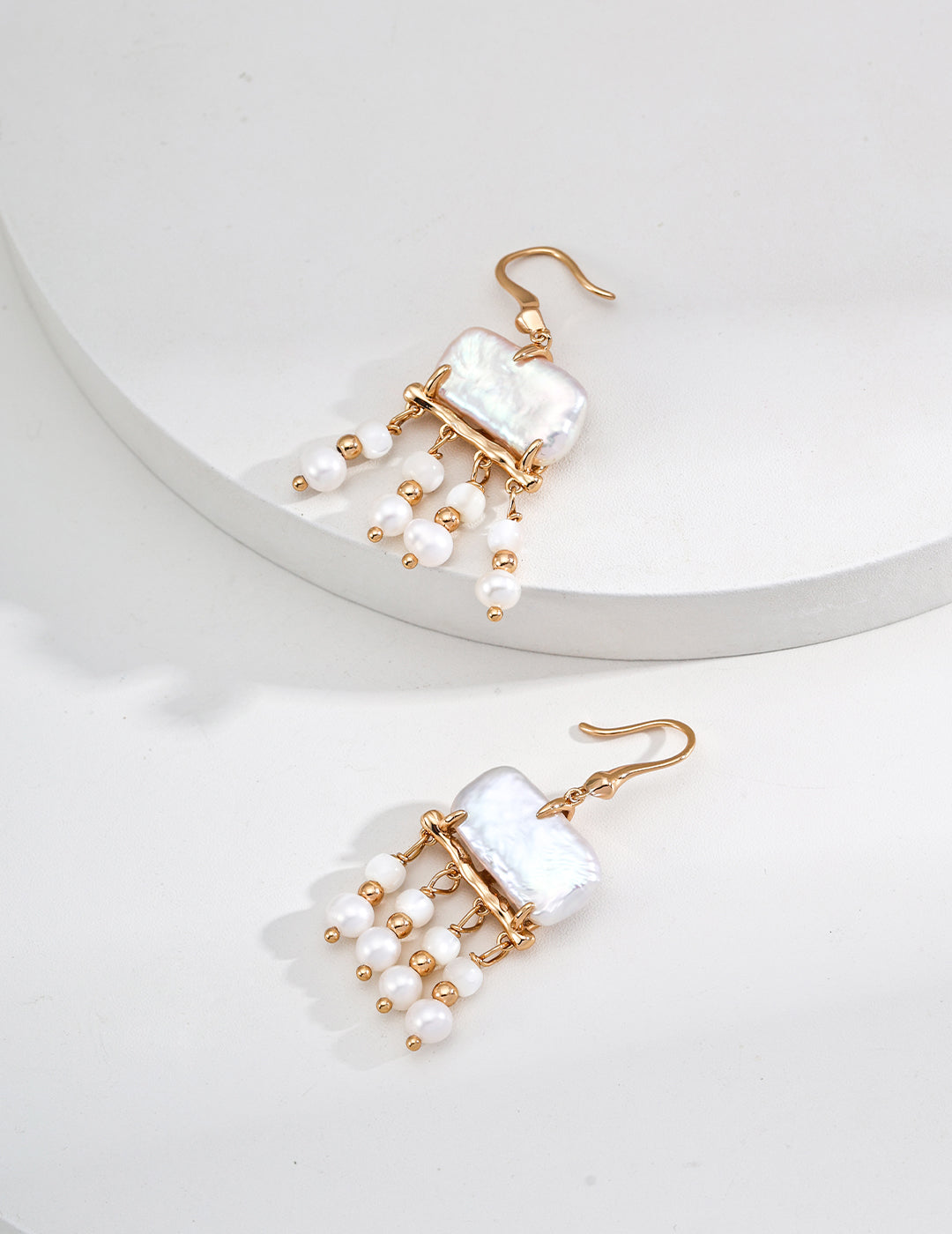 S925 silver earrings with a sense of design, featuring natural mother-of-pearl