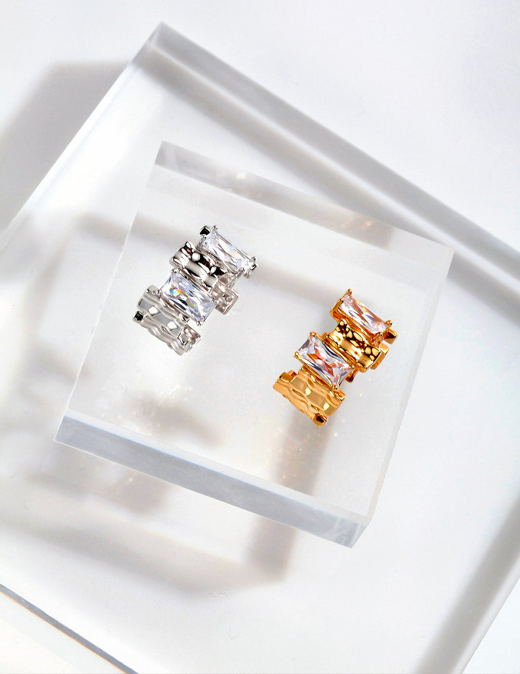 Ring with irregular rectangular spaced zircon design